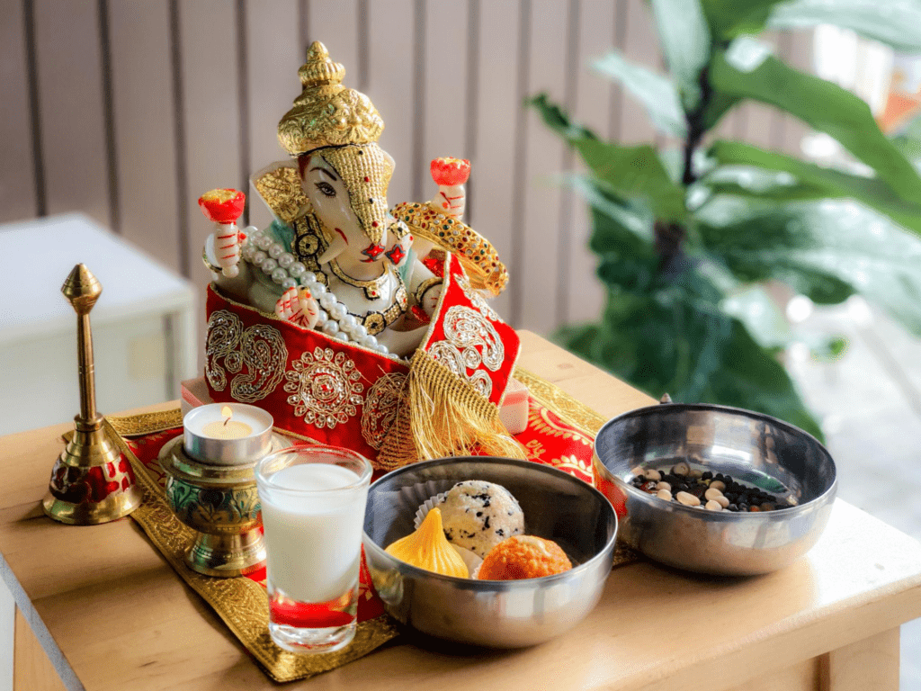 Priest performing Ganesh Chaturthi Madhyahna puja during the auspicious muhurat