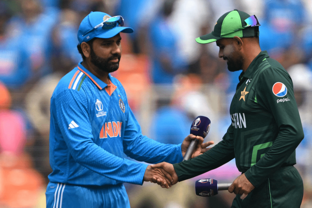 Indian and Pakistani cricket captains shaking hands before an ICC match amid ongoing bilateral tensions