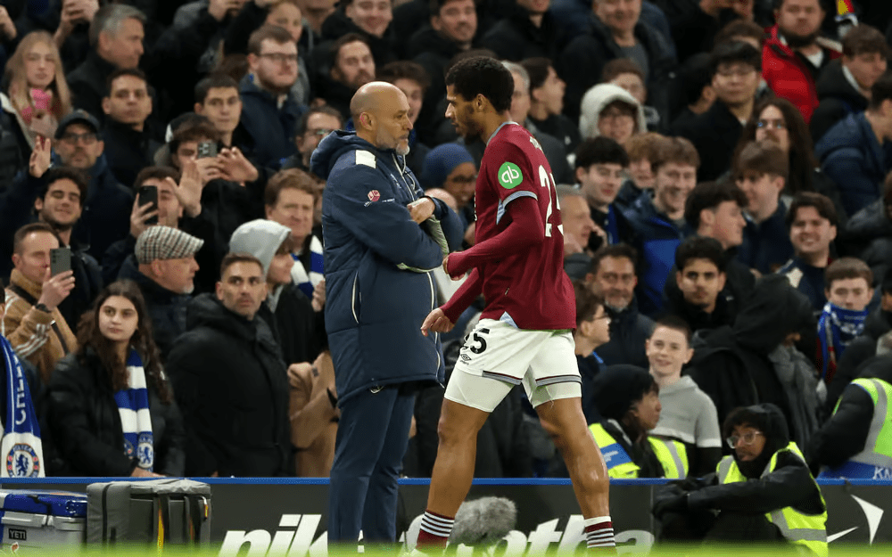 West Ham players reacting after a red card incident during Premier League fixture