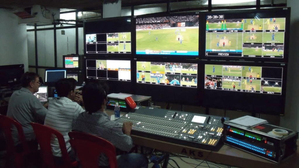 Broadcast control room and stadium sponsorship displays during India vs Pakistan ICC fixture